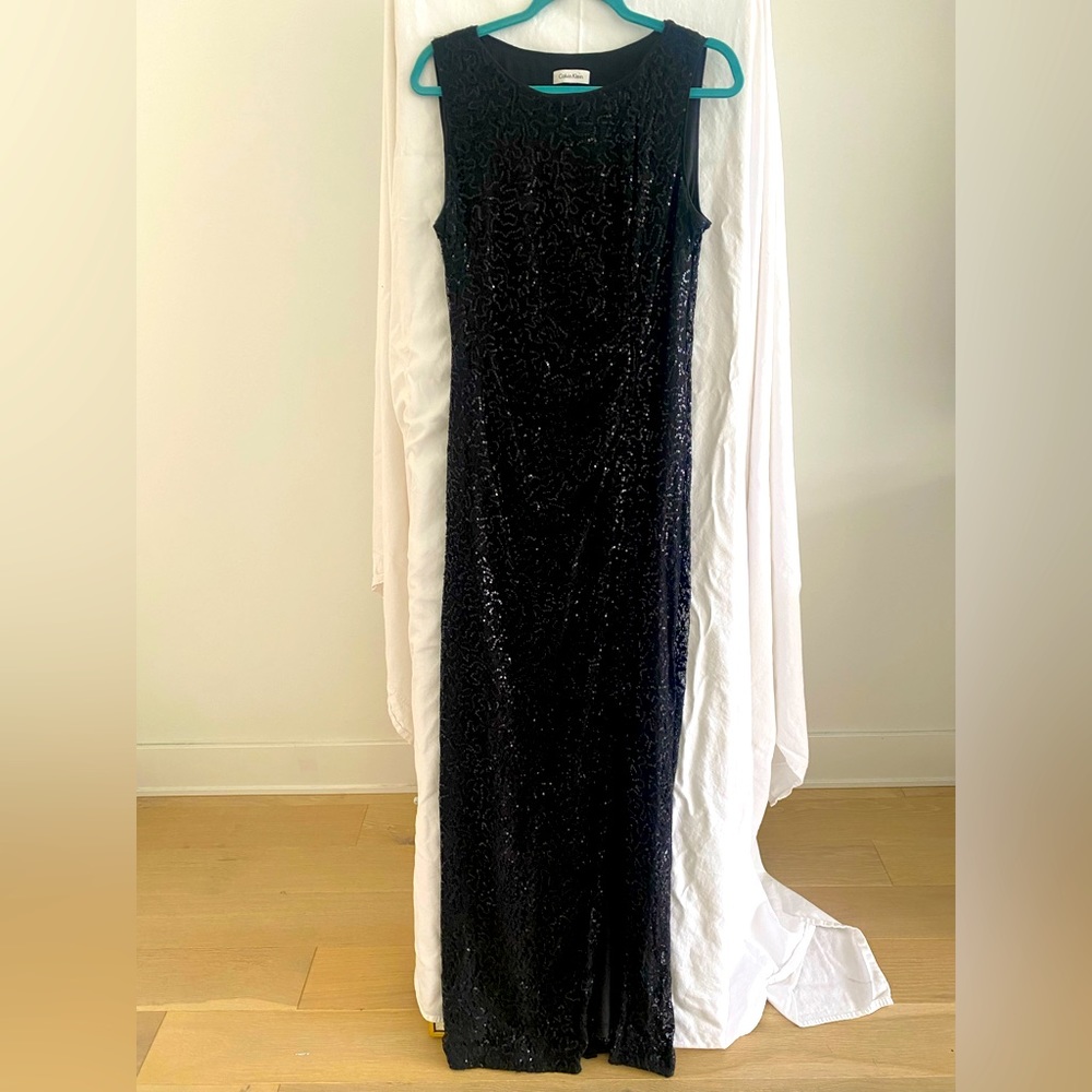 Calvin Klein size 12 black sleeveless sequins  long gown with front slit.